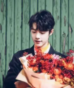 Xiao Zhan with flowers 